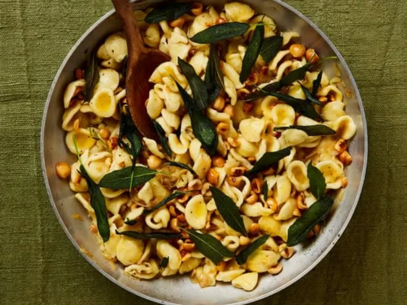 Caramelized onion orecchiette with hazelnuts and sage