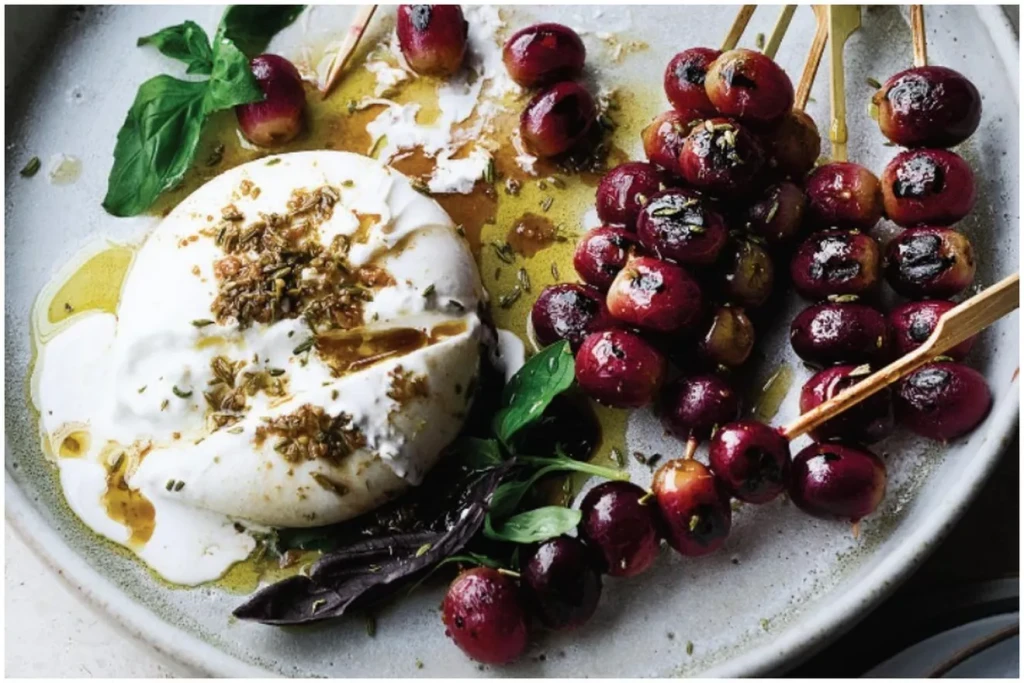 Ottolenghi's Burrata With Grilled Grapes & Basil