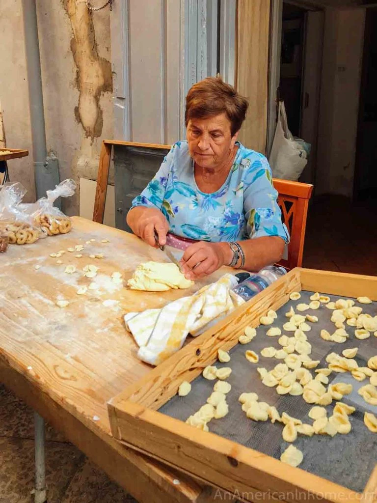 Nonna (Grandmother) making fresh pasta on the streets of Monopoli, Puglia