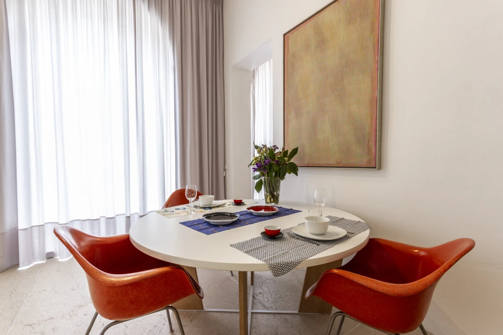 Dining area with Chairs by Eames