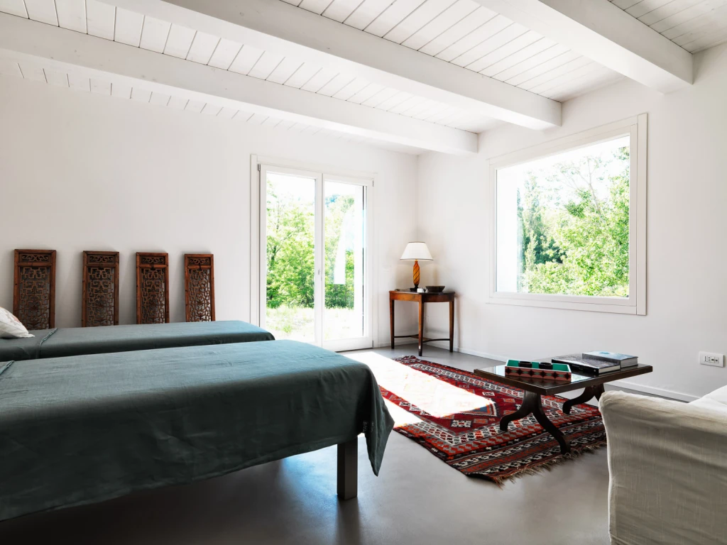 A stylish and zen bedroom at Villa Rivo