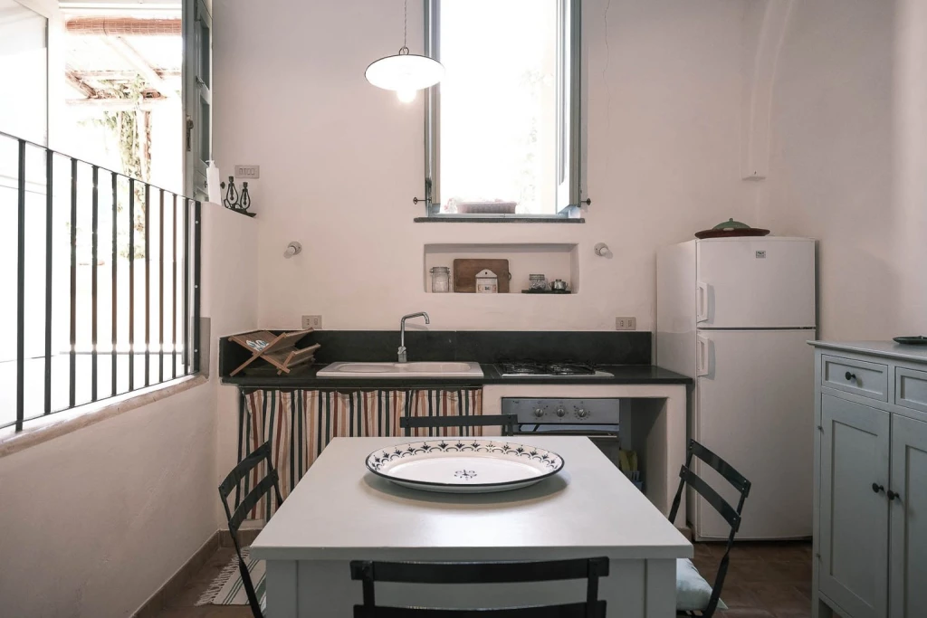 This beautifully renovated apartment is located here, accommodating up to 2 + 1 guests respectively, and overlooks a small porch where you can relax on hot summer days among lemon trees, flowers, and Mediterranean essences.