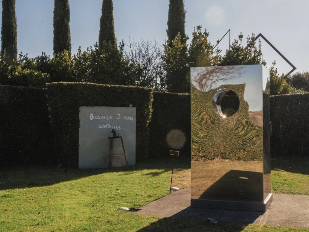Art by Anish Kapoor and Banksy in the private garden