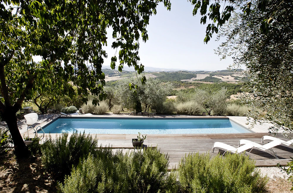 The pool overlooking the rolling foothills of Umbria